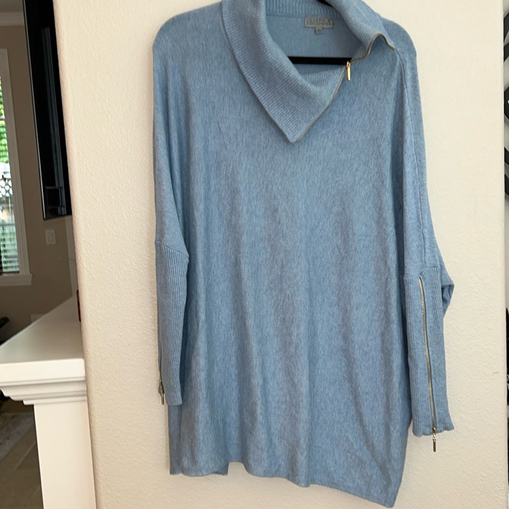 Women’s Sweater Size Small but could be a one size. Blue Turtle Neck Beautiful!